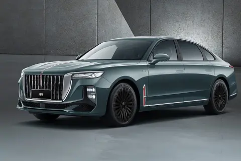 Elegancki, ciemnozielony sedan z charakterystycznym grillem, jeden z nowych, imponujących chinskie marki aut.